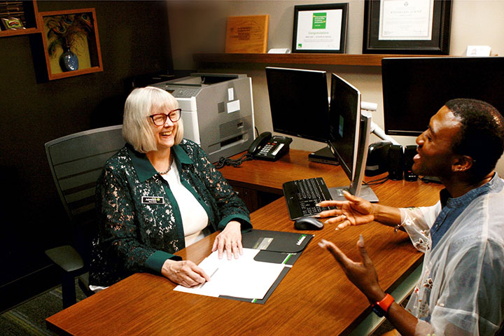 Terrance and Mary going over taxes in the office