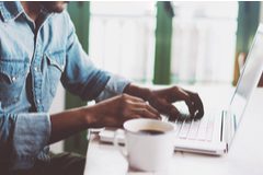 business owner using payroll software
