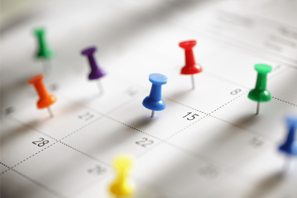 Calendar with push pins marking tax extension dates