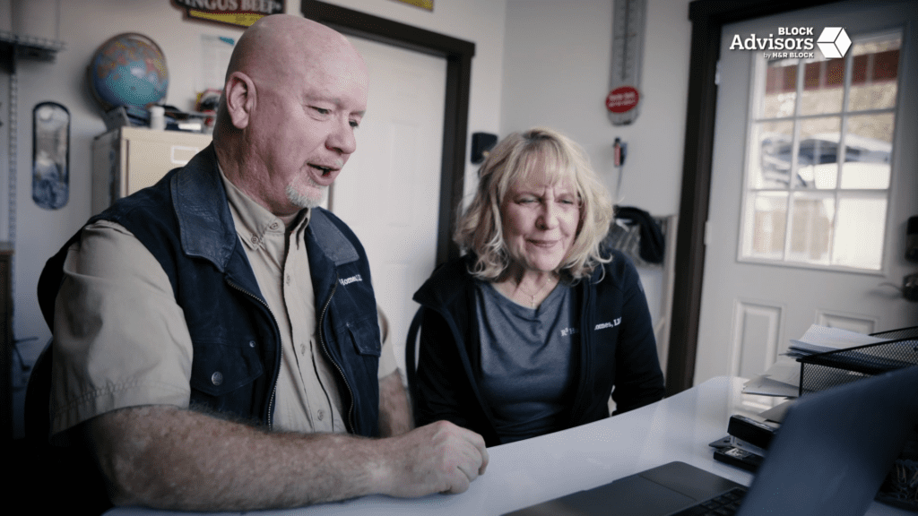Jim Erickson and Leanne Knapp discuss their small business taxes and bookeeping with a Block Advisors expert virtually on a video call from their office.