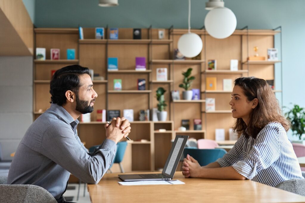 HR manager considers documents needed to hire their first employee