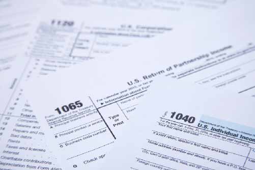 a stack of various tax forms