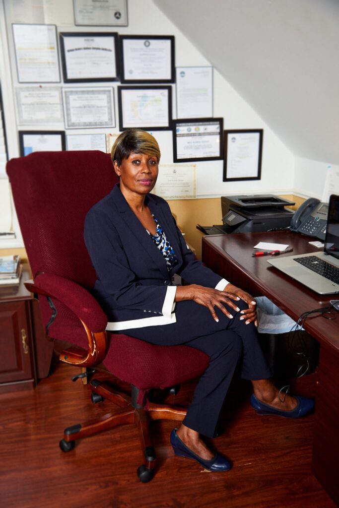 PatriciaCordova-at-desk-scaled.jpg Patricia Cordova working