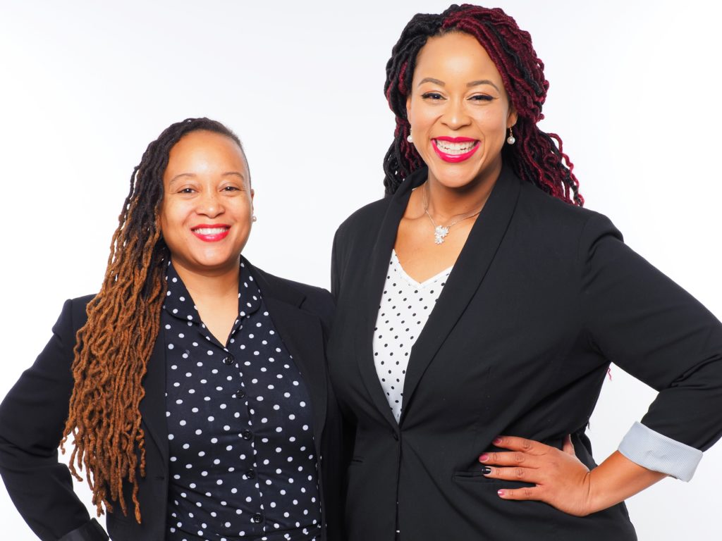 Dr. Tomicka Wagstaff and Stephanie Paredes standing together and smiling