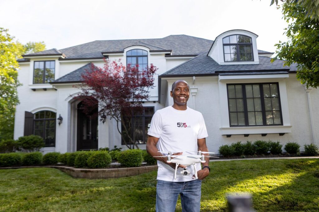 Reginald Hines holding a drone