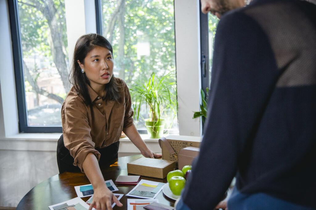 Heather discusses brand strategy with her new employee