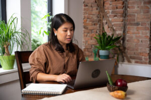 Heather Jiang, owner of Allegorie, talks with her Block Advisors bookkeeper during a virtual check-in.