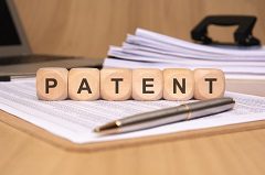 Patent on wooden blocks sitting on a patent application